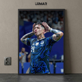 Framed poster of Enzo Fernández celebrating in a unique blue patterned Argentina jersey with his hands to his ears.